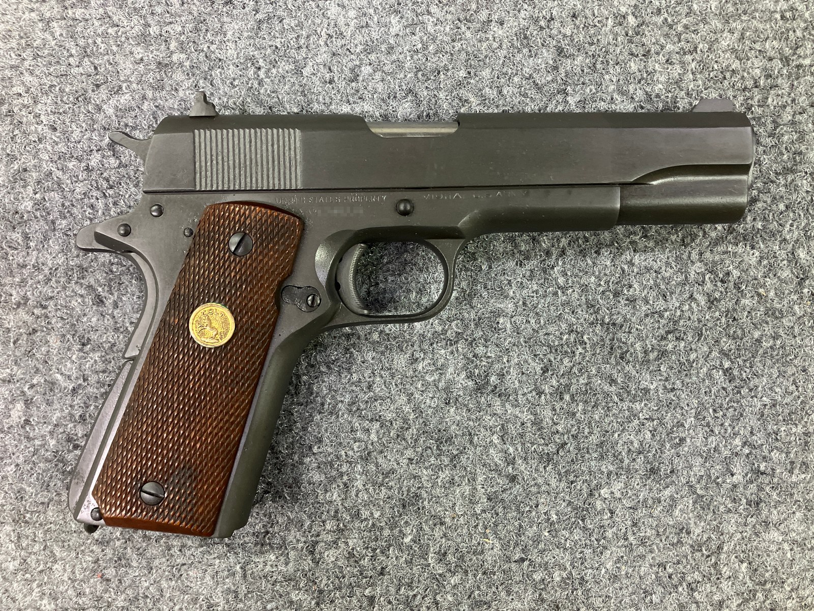 USGI 1911 after Parkerization restoration, matte gray phosphate finish